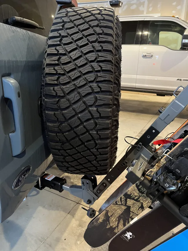 Buzz rack ski rack fully tilted with the ford bronco spare tire